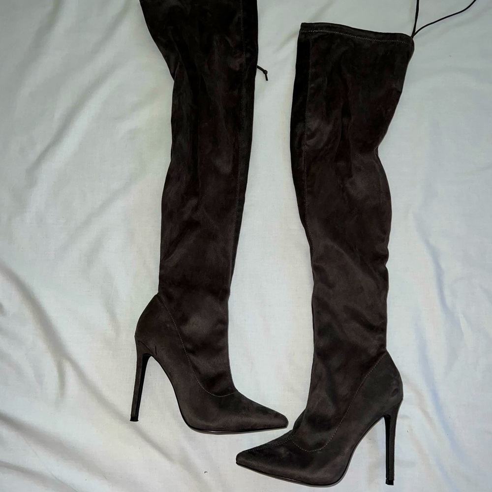 Forever 21 long boots gray color, I bought them in NY city and used them once.